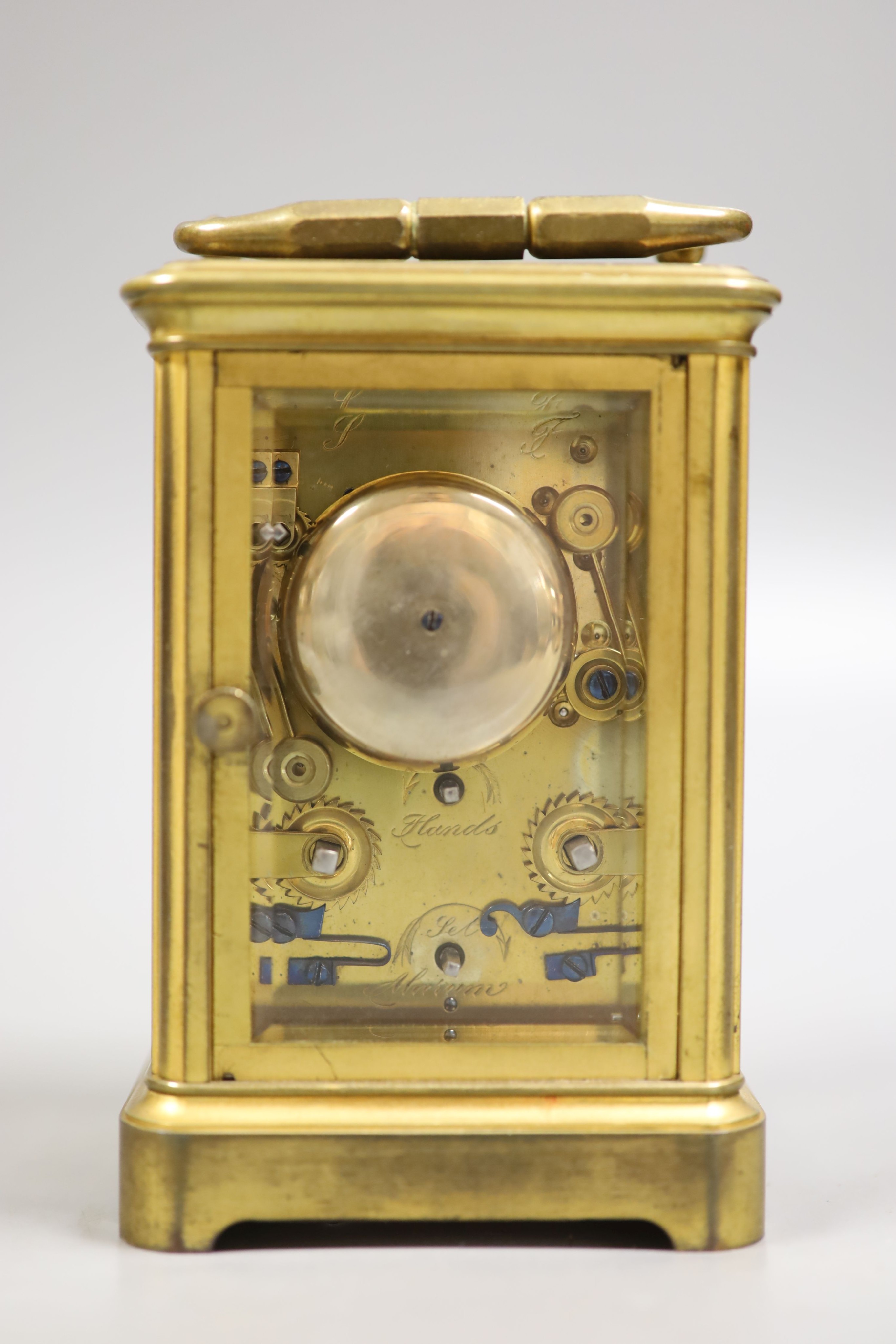 An early 20th century French brass carriage clock with alarm, 16cm high handle up, cased